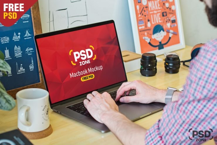 Man Working on Macbook Mockup PSD