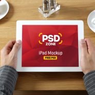 iPad in Hand Mockup Free PSD
