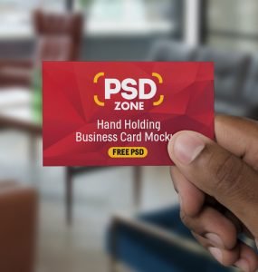 Hand Holding Business Card Mockup PSD