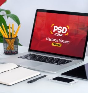 Macbook on Desk Mockup PSD