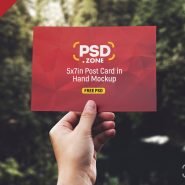 PSD Hand Holding Postcard Mockup