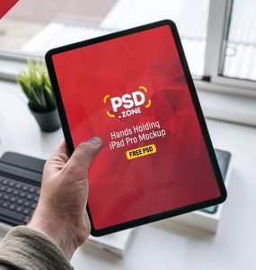 Hand Holding New iPad Pro Mockup