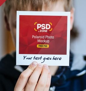 Hand Holding Polaroid Photo Mockup