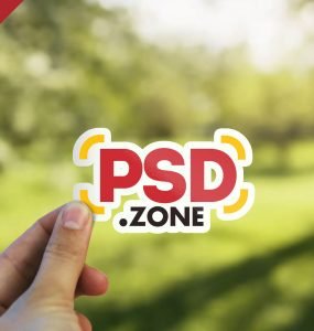 Hand Holding Sticker Mockup PSD