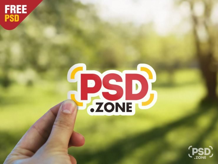 Hand Holding Sticker Mockup PSD