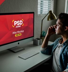 Man using iMac Mockup PSD
