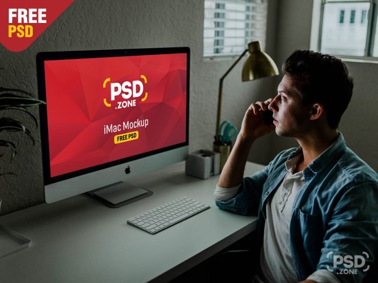 Man using iMac Mockup PSD